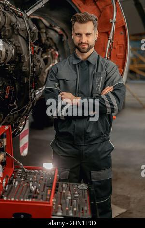 Сar driver using variety repair tools for repairing and diagnostic a car.  Tool set near the orange auto. Mechanic tools in box, closeup Stock Photo -  Alamy