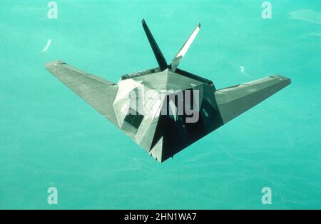 F-117A Stealth fighter in flight Stock Photo