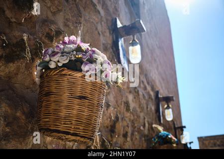 Flowers in a wicker basket Stock Photo