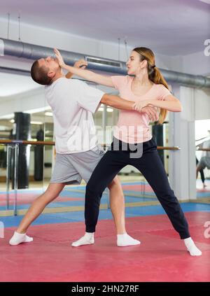 Self Defence or Self Defense Techniques in a Fight Stock Photo - Alamy