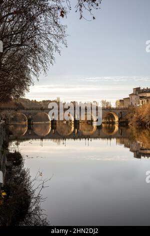 Roman bridge over the river Virdoule, Sommières, Gard, South of France Stock Photo
