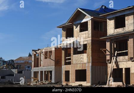 New single family wood framed homes under construction in the greater Victoria community of  Colwood, British Columbia on Vancouver Island on February Stock Photo