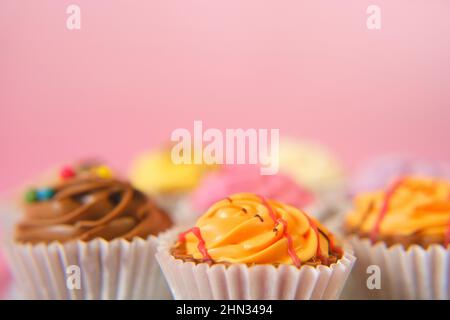 Cream cupcakes.cakes .Cream dessert. Assorted sweet table. Sweets and desserts. Baked goods  Stock Photo