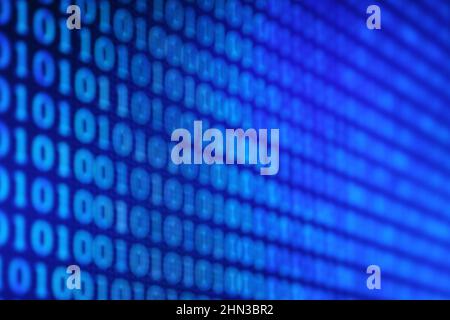 Illustration of running binary codes on a blue blurry background Stock Photo