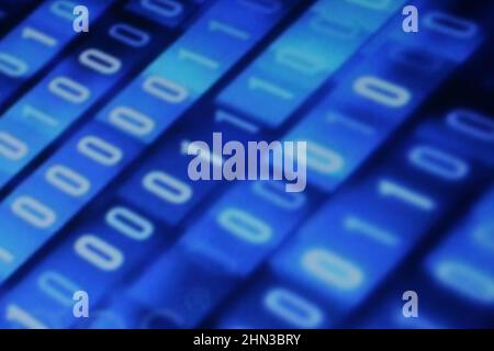 Illustration of running binary codes on a blue blurry background Stock Photo