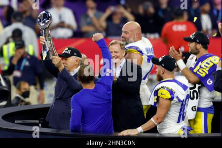 Jhonny Mac's Sporting Goods manager Jordan Spurlock arranges St Louis Rams  merchandise, one day after it was announced that the football team will  relocate to Los Angeles at the Ballwin,Missouri store on