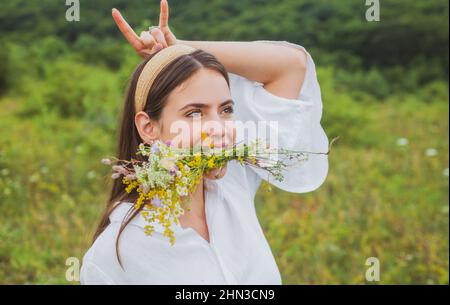 Vegan crazy people concept. Vegetarian woman. Take in veggie. Cow girl, healthy lifestyle. Organic field milka. Stock Photo