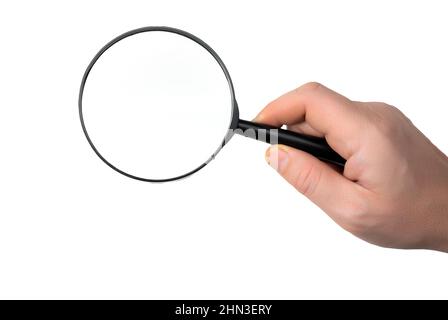 Hand holding magnifying glass isolated on white background. male hand holding black magnifying glass. Research, searching or investigating something. Stock Photo
