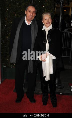 **FILE PHOTO** Ivan Reitman Has Passed Away. Director Ivan Reitman and wife Geneviève Robert at the Los Angeles premiere of 'No Strings Attached' at the Regency Village Theater in Westwood, CA, USA.January 11, 2011 © mpi11/MediaPunch Inc. Stock Photo
