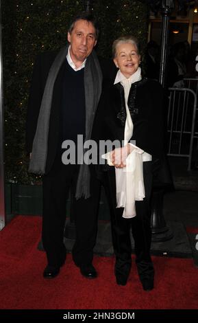 **FILE PHOTO** Ivan Reitman Has Passed Away. Director Ivan Reitman and wife Geneviève Robert at the Los Angeles premiere of 'No Strings Attached' at the Regency Village Theater in Westwood, CA, USA.January 11, 2011 © mpi11/MediaPunch Inc. Stock Photo