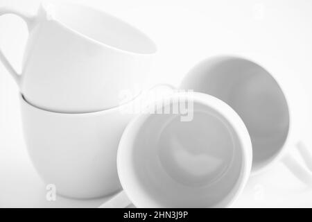 close up of white cups on white background, highkey Stock Photo