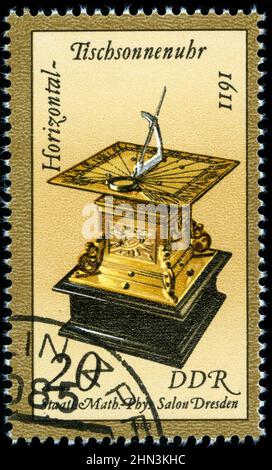 Postage stamp from East Germany (DDR) in the Sand and Sun Clocks from the State Mathematical-Physical Sal series issued in 1983 Stock Photo