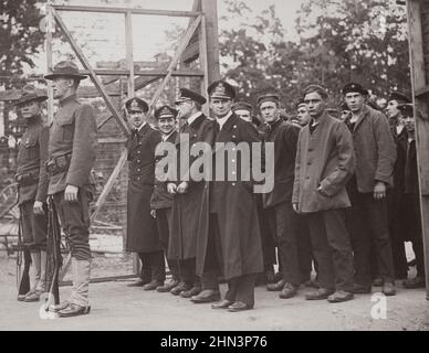 Vintage photo of officers and crew of the German submarine U.58, captured by the U.S.S. Fanning, entering the War Prison Camp at Fort McPherson, Georg Stock Photo