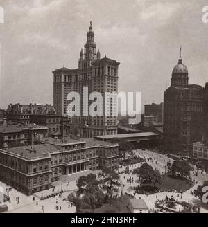 Vintag photo of old and new city halls and World Building, from City Hall Park, New York City, USA. 1910s Stock Photo