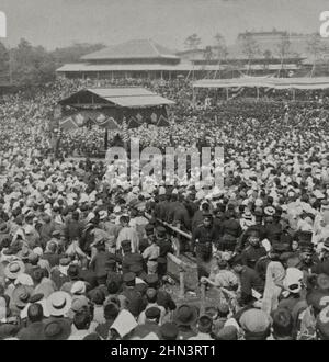 Vintage photo of a wrestling match, Japan's favorite sport, watched by 20,000 spectators. Tokyo, Japan. 1905 Stock Photo