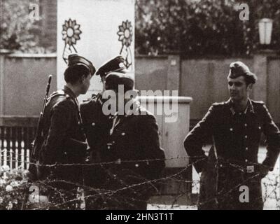 Berlin Crisis of 1961. Serie of archivel photos depicts the August 1961 travel ban between East and West Berlin and shows the building of barricades t Stock Photo