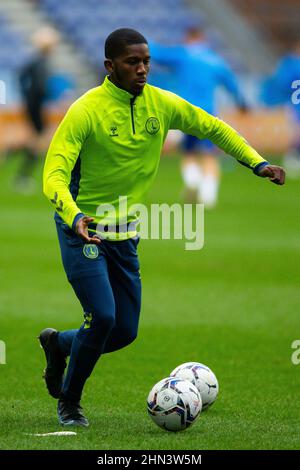 Charlton Athletic’s Daniel Kanu warms up on the pitch ahead of the Sky Bet League One match at the DW Stadium, Wigan. Picture date: Saturday February 12, 2022. Stock Photo