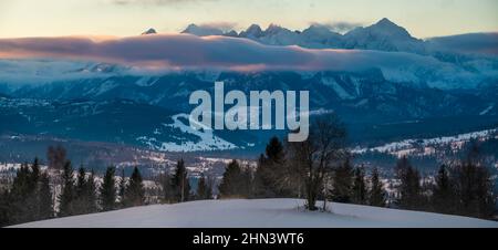 Mountain, winter panorama during a dramatic sunrise Stock Photo