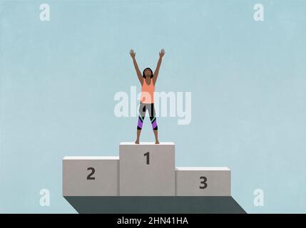 Victorious female athlete standing with arms raised, celebrating on 1st Place podium Stock Photo