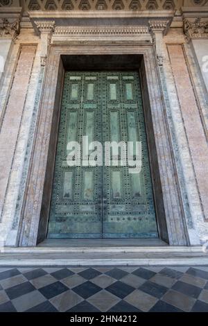 Vertical shot of an antique gate of Basilica of San Giovanni in Laterano, Italy Stock Photo