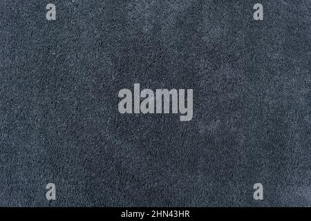 Carpet texture background. Black gray cotton carpet for floor coverings. Material for interior design and decoration of living rooms. High quality photo Stock Photo