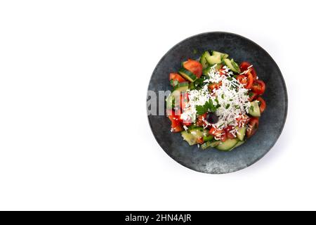 Traditional Bulgarian shopska salad with tomato,cucumber and bulgarian sirene cheese isolated on white background Stock Photo