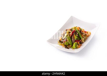 Beef, vegetables and sesame seeds in white plate isolated on white background Stock Photo