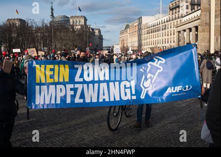 12.02.2022, Berlin, Germany, Europe - Corona deniers, vaccination opponents and sceptics protest during a demonstration against Covid vaccine mandate. Stock Photo