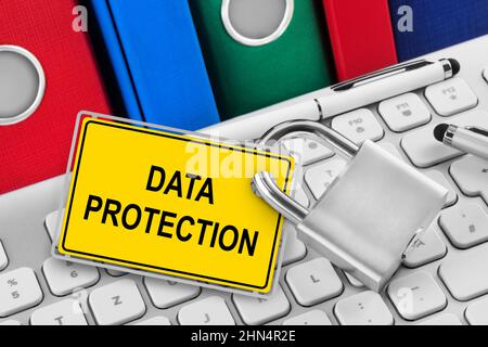 Yellow sign and Data Protection on PC keyboard Stock Photo