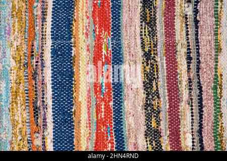 Close up photo of hand crafted, traditional and colorful rug-carpet made with recycled material. High quality photo Stock Photo