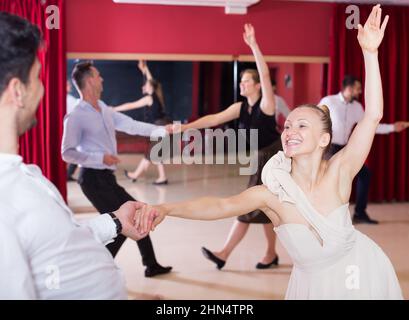 People practicing lindy hop movements Stock Photo