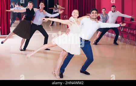 Glad people practicing passionate samba Stock Photo