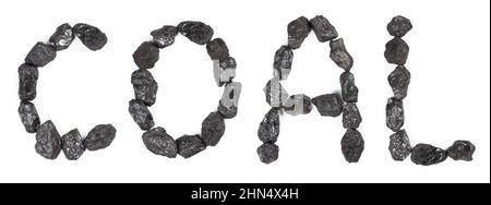 Word Coal made from black stone coal isolated on white background top view. Stock Photo