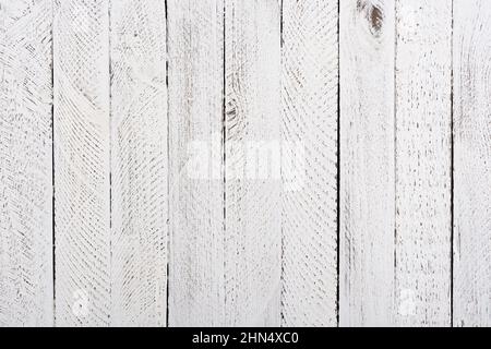 White wooden table background top view. Rustic painted old planks wood texture backdrop. Stock Photo