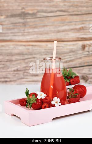 Homemade strawberry and raspberry fruit lemonade in jar Stock Photo