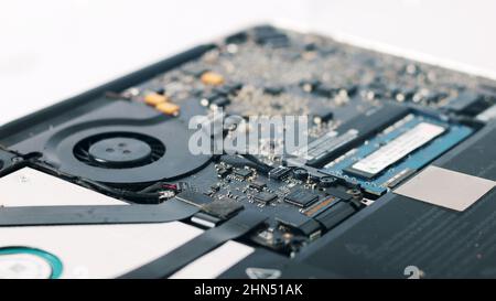 Electronic device mainboard PCB in laptop. white background Stock Photo