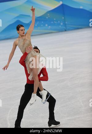 Beijing, China. 14th Feb, 2022. Gabriella Papadakis (front) and Guillaume Cizeron of France perform during the figure skating ice dance free dance match of Beijing 2022 Winter Olympics at Capital Indoor Stadium in Beijing, capital of China, February 14, 2022. Photo by Giuliano Bevilacqua/ABACAPRESS.COM Credit: Abaca Press/Alamy Live News Stock Photo