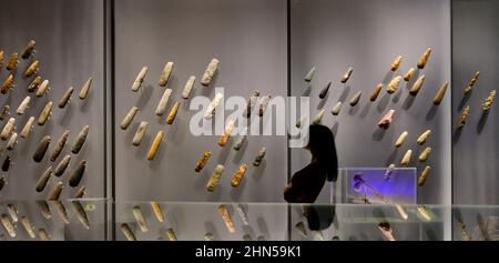 The British Museum London, UK. 14 February 2022. The World of Stonehenge, the UK’s first ever major exhibition on Stonehenge and the largest British Museum exhibition of recent times – running from 17 Feb-17 July 2022. Image: Extensive display of tools carved by Neolithic Britons. Credit: Malcolm Park/Alamy Live News. Stock Photo