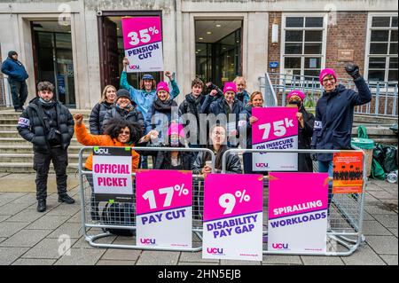London, UK. 14th Feb, 2022. Four fights one union - A picket line outside SOAS and UCL as lecturers strike because they are 'at breaking point'. They are worried about gender, ethnic, pensions and disability pay gaps, job insecurity, and rising workloads. Credit: Guy Bell/Alamy Live News Stock Photo