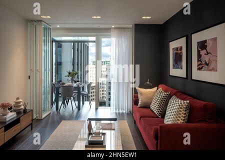 Living area in 14th floor apartment. 8-13 Casson Square, London, United Kingdom. Architect: Patel Taylor Architects, 2022. Stock Photo