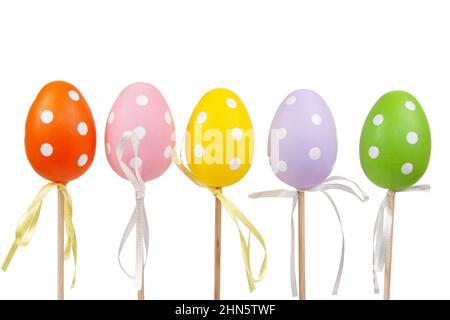 Multicolored easter eggs in dots isolated on the white background Stock Photo