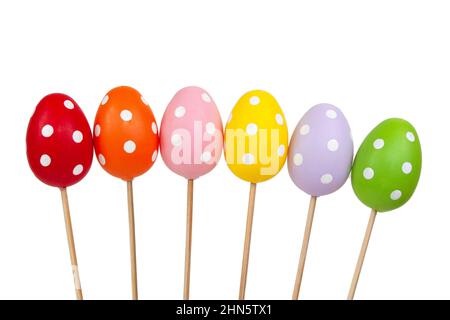 Multicolored easter eggs in dots isolated on the white background Stock Photo