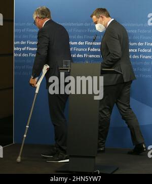 Berlin, Germany. 14th Feb, 2022. Christian Lindner (FDP), Federal Minister of Finance, and his counterpart from Austria, Magnus Brunner (l), leave a room in the Federal Ministry of Finance after a press conference. Credit: Wolfgang Kumm/dpa/Alamy Live News Stock Photo