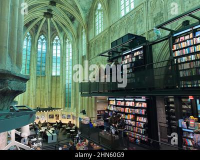 Maastricht (Boekhandel Dominicanen), Netherlands - February 13. 2022: View inside medieval Dominican Church converted into bookstore Stock Photo