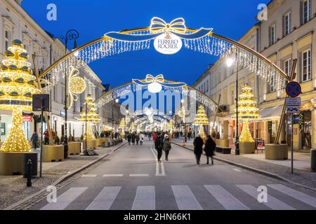 City of Warsaw in Poland, New World Street (Nowy Świat) during holiday season, part of the Royal Route. Stock Photo