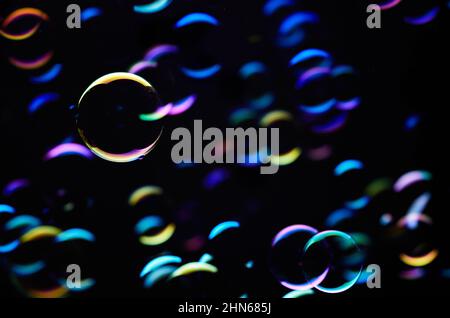 The colorful light reflection on the bubbles in the dark Stock Photo