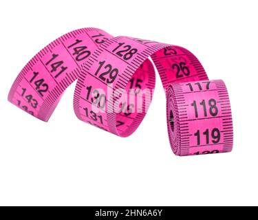 Pink tape measure roll isolated on the white background Stock Photo - Alamy