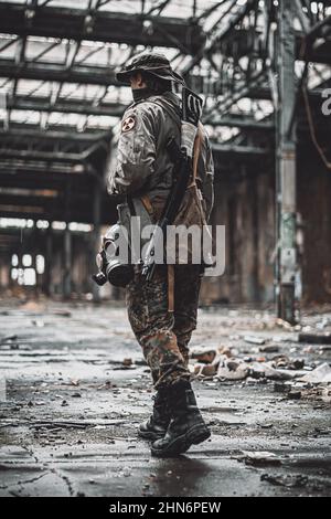 Vertical shot of a Stalker from Chernobyl on his adventure in Poznan, Poland Stock Photo