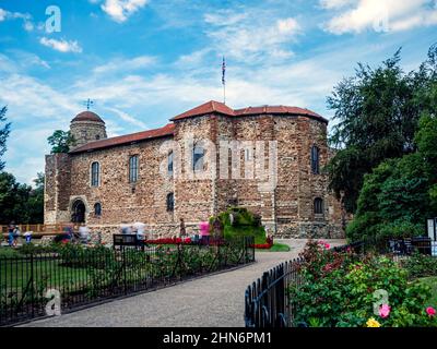 COLCHESTER, ESSEX, UK - AUGUST 11, 2018:  Exterior view of Colchester Castle in Castle Park with people in motion blur Stock Photo