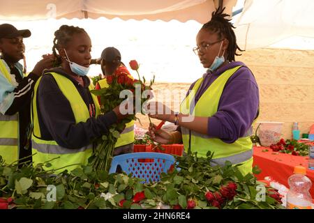 Nairobi, Kenya. 14th Feb, 2022. Florists are seen packing flowers during Valentine's Day in downtown, Nairobi. (Photo by John Ochieng/SOPA Images/Sipa USA) Credit: Sipa USA/Alamy Live News Stock Photo